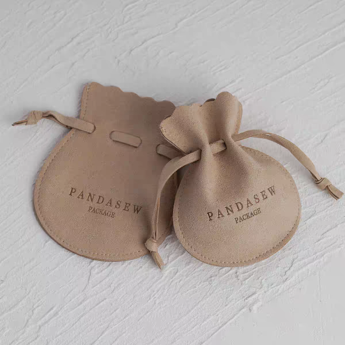 Suede Half-circle Drawstring Bag